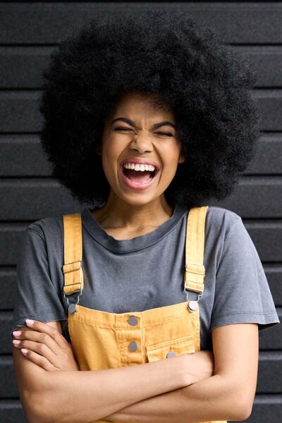 portrait-of-young-laughing-black-woman-isolated-on-XGATQ8D-1.jpg